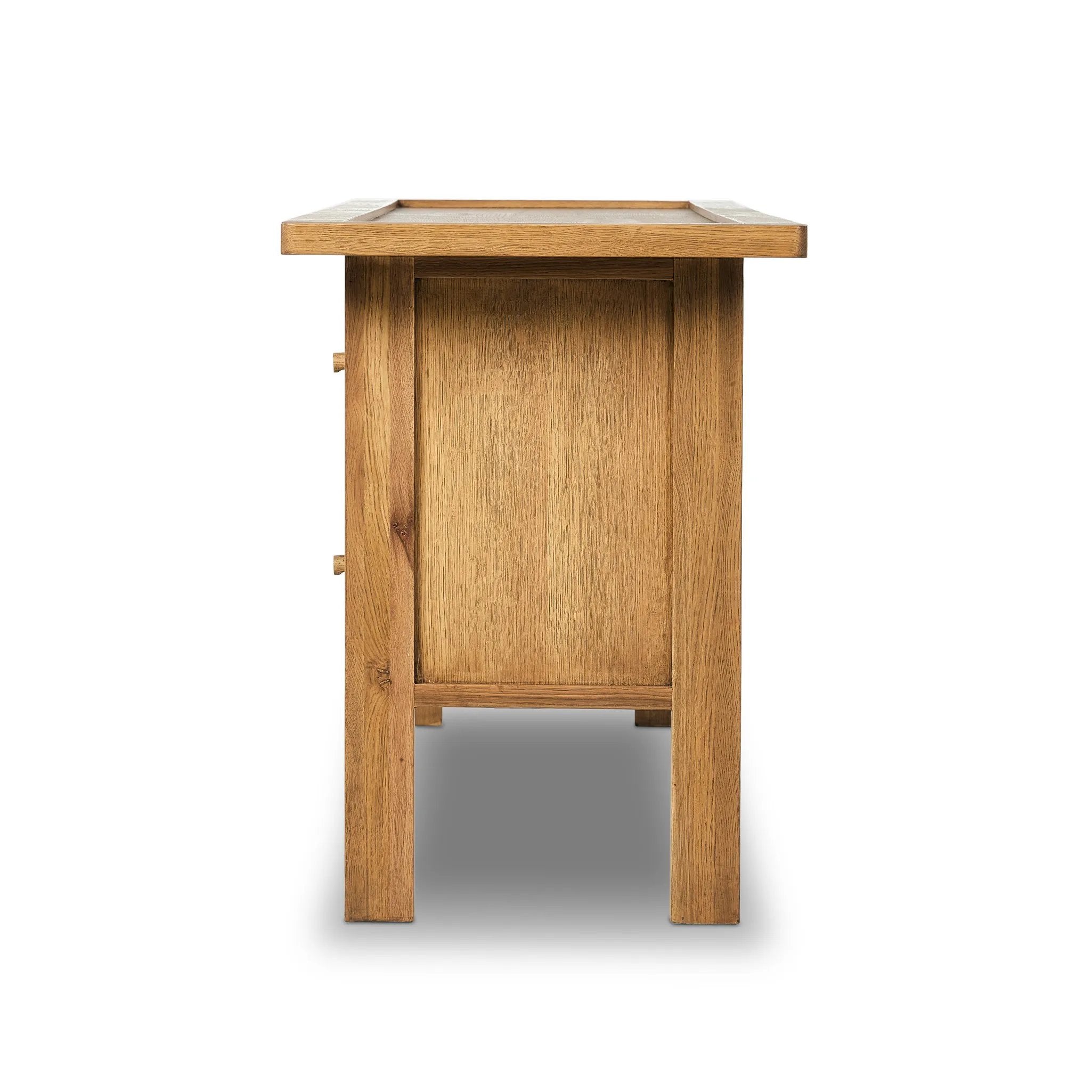 Inspired by a vintage general store counter, this console table features a heritage design with a modern twist. Thick oak legs with softened corners provide sturdy support, while oak knobs add a touch of classic charm. The inset tray top and varied drawer configuration offer ample storage Amethyst Home provides interior design, new home construction design consulting, vintage area rugs, and lighting in the Houston metro area.