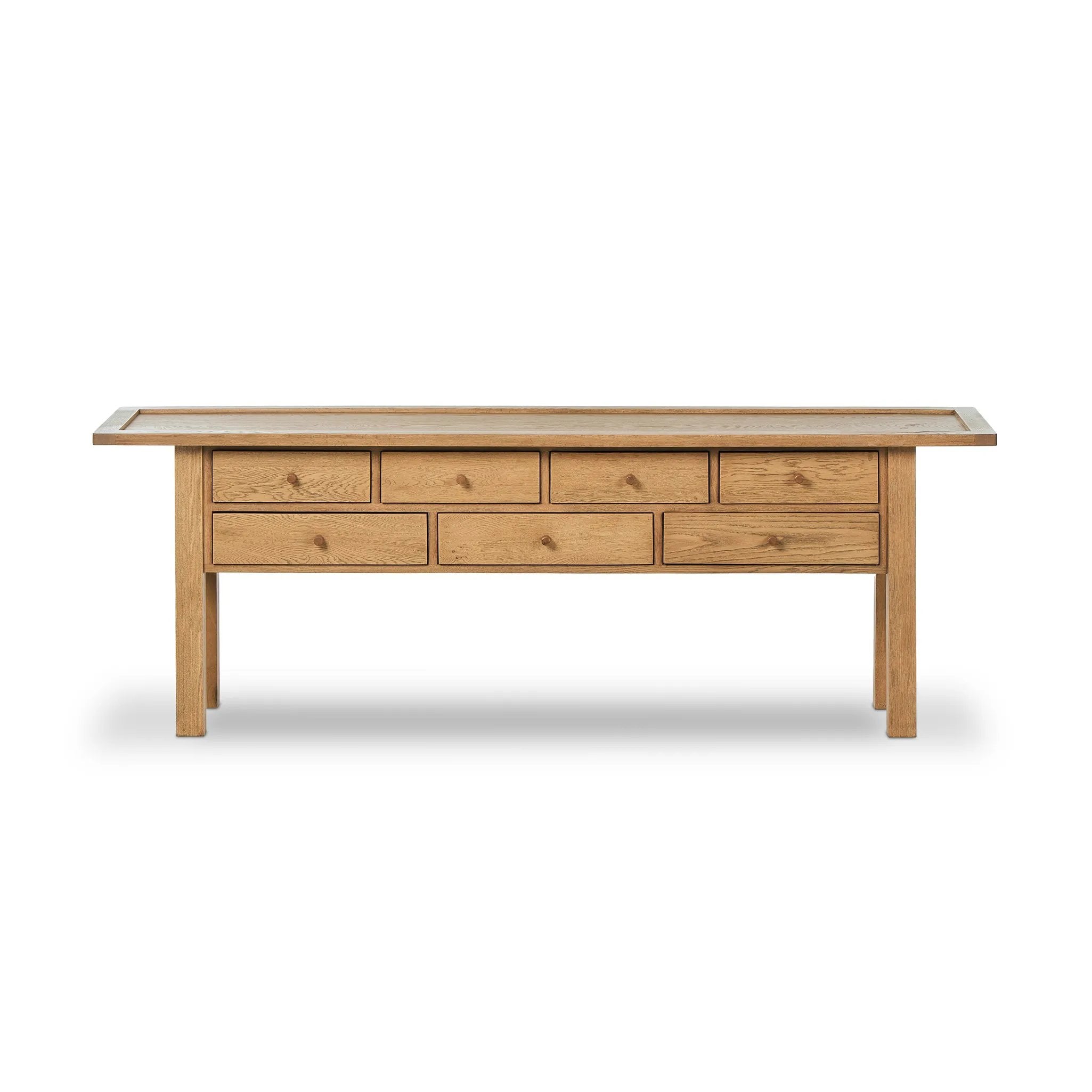 Inspired by a vintage general store counter, this console table features a heritage design with a modern twist. Thick oak legs with softened corners provide sturdy support, while oak knobs add a touch of classic charm. The inset tray top and varied drawer configuration offer ample storage Amethyst Home provides interior design, new home construction design consulting, vintage area rugs, and lighting in the Portland metro area.