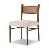 Mixed materials place a modern twist on the sling-back dining chair. A solid oak frame forms rounded dowel legs for a touch of traditionalism, with top-grain leather in a warm chestnut Amethyst Home provides interior design, new home construction design consulting, vintage area rugs, and lighting in the Boston metro area.