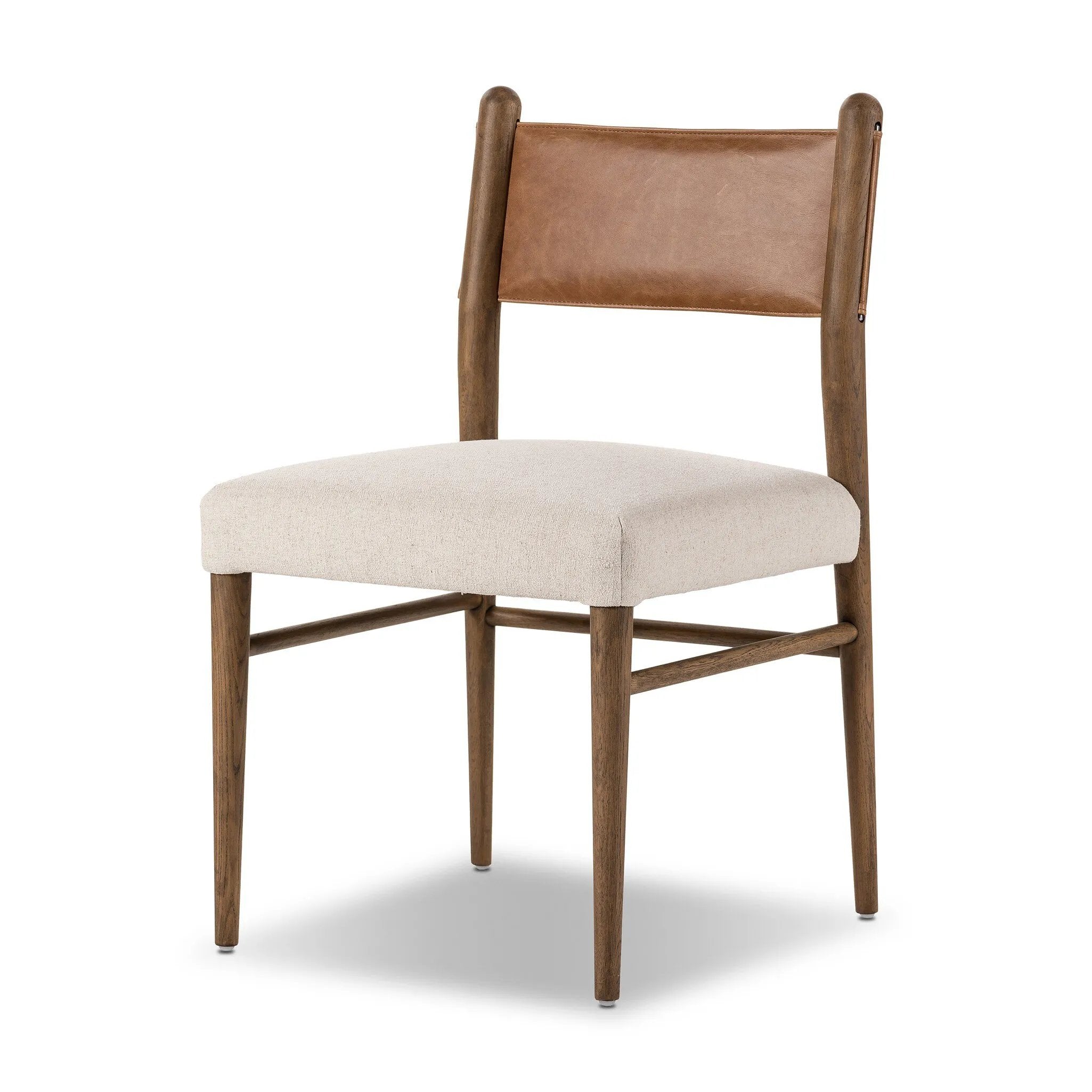 Mixed materials place a modern twist on the sling-back dining chair. A solid oak frame forms rounded dowel legs for a touch of traditionalism, with top-grain leather in a warm chestnut Amethyst Home provides interior design, new home construction design consulting, vintage area rugs, and lighting in the Boston metro area.