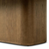 This monolithic piece features a grand plinth base, subtly rounded corners and bullnose edges. A mix of solid oak and oak veneer offers the best of both worlds: beautiful movement from the natural oak graining and added character from the burl veneer finish. Amethyst Home provides interior design, new home construction design consulting, vintage area rugs, and lighting in the Newport Beach metro area.