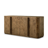 Finished in a unique rye, a mix of solid oak and oak veneer shape a simplified four-door sideboard, with subtly rounded corners for a touch of softness. Large, exaggerated hardware finishes the look.As fans of natural aesthetics at Amethyst, we love the nature inspired Morley Sideboard - Rye Medium Burl Oak Veneer. Amethyst Home provides interior design, new home construction design consulting, vintage area rugs, and lighting in the Kansas City metro area.