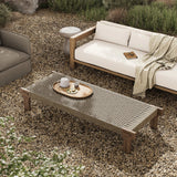 Featuring Moxie Stained Toasted Brown Outdoor Coffee Table by Four Hands at Amethyst Home. Create an outdoor space that transports you to far corners of the globe. Inspired by traditional designs found throughout Indonesia, this outdoor bench features a beautifully crafted frame made of FSC-certified solid teak with pull-through details and monochromatic weavin. Amethyst Home provides interior design, new home construction design consulting, vintage area rugs, and lighting in the Miami metro area.
