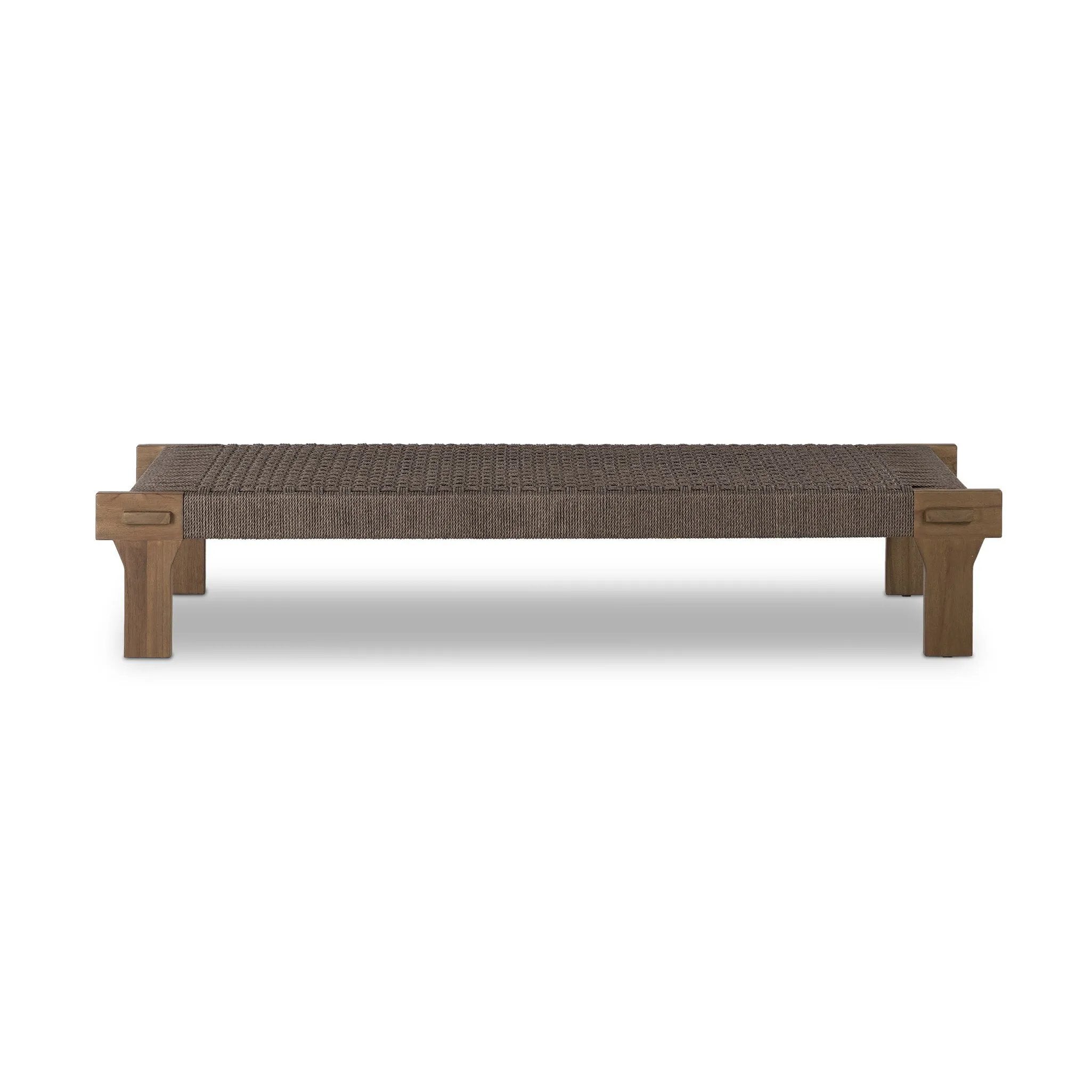 Featuring Moxie Stained Toasted Brown Outdoor Coffee Table by Four Hands at Amethyst Home. Create an outdoor space that transports you to far corners of the globe. Inspired by traditional designs found throughout Indonesia, this outdoor bench features a beautifully crafted frame made of FSC-certified solid teak with pull-through details and monochromatic weavin. Amethyst Home provides interior design, new home construction design consulting, vintage area rugs, and lighting in the Tampa metro area.