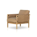 Safari inspiration meets zen aspirations. A cylindrical frame is crafted, smoothed and rounded from solid ash wood. Includes two loose feather-blend cushions covered in subtly distressed thick cut leather in a neutral taupe hue for a monochromatic look Amethyst Home provides interior design, new home construction design consulting, vintage area rugs, and lighting in the Boston metro area.
