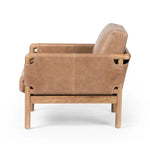 Safari inspiration meets zen aspirations. A cylindrical frame is crafted, smoothed and rounded from solid ash wood. Includes two loose feather-blend cushions covered in subtly distressed thick cut leather in a neutral taupe hue for a monochromatic look Amethyst Home provides interior design, new home construction design consulting, vintage area rugs, and lighting in the Des Moines metro area.