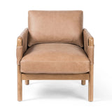 Safari inspiration meets zen aspirations. A cylindrical frame is crafted, smoothed and rounded from solid ash wood. Includes two loose feather-blend cushions covered in subtly distressed thick cut leather in a neutral taupe hue for a monochromatic look Amethyst Home provides interior design, new home construction design consulting, vintage area rugs, and lighting in the Los Angeles metro area.