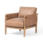 Safari inspiration meets zen aspirations. A cylindrical frame is crafted, smoothed and rounded from solid ash wood. Includes two loose feather-blend cushions covered in subtly distressed thick cut leather in a neutral taupe hue for a monochromatic look Amethyst Home provides interior design, new home construction design consulting, vintage area rugs, and lighting in the Miami metro area.