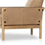 Safari inspiration meets zen aspirations. A cylindrical frame is crafted, smoothed and rounded from solid ash wood. Includes two loose feather-blend cushions covered in subtly distressed thick cut leather in a neutral taupe hue for a monochromatic look Amethyst Home provides interior design, new home construction design consulting, vintage area rugs, and lighting in the Omaha metro area.