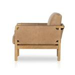 Safari inspiration meets zen aspirations. A cylindrical frame is crafted, smoothed and rounded from solid ash wood. Includes two loose feather-blend cushions covered in subtly distressed thick cut leather in a neutral taupe hue for a monochromatic look Amethyst Home provides interior design, new home construction design consulting, vintage area rugs, and lighting in the Tampa metro area.