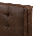 Subtle, modern elegance. A low, tufted headboard in a vintage tobacco faux leather pairs with a simple gunmetal iron base Amethyst Home provides interior design, new home construction design consulting, vintage area rugs, and lighting in the Los Angeles metro area.