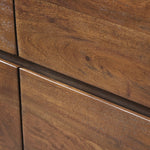 Made from solid acacia and finished in a rustic brown, a six-drawer, waterfall-shaped dresser features soft volume, mitered corners and a faux live edge Amethyst Home provides interior design, new home construction design consulting, vintage area rugs, and lighting in the Seattle metro area.