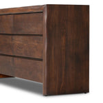Made from solid acacia and finished in a rustic brown, a six-drawer, waterfall-shaped dresser features soft volume, mitered corners and a faux live edge Amethyst Home provides interior design, new home construction design consulting, vintage area rugs, and lighting in the Washington metro area.