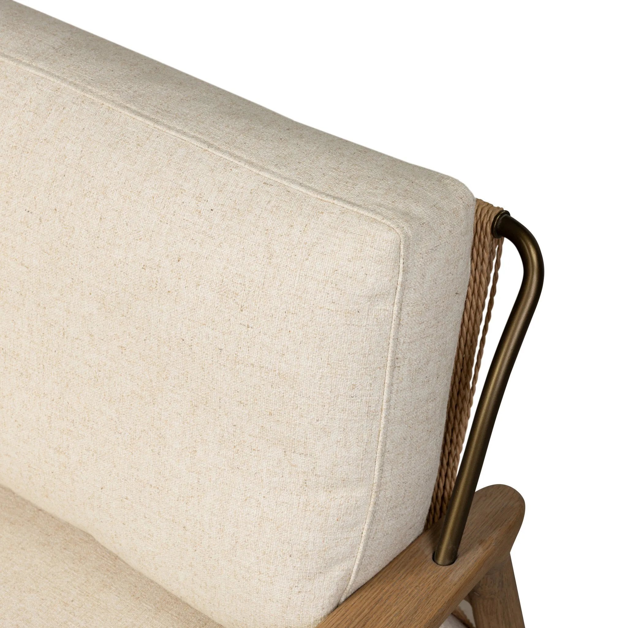 Angular wood and metal intersect across the waterfall paper cord back of this accent chair, with a tight seat and loose boxed back cushion adding comfort.As lovers of organic modern design at Amethyst, we love the warm modern inspired Nisha Chair - Antwerp Natural. Amethyst Home provides interior design, new home construction design consulting, vintage area rugs, and lighting in the Kansas City metro area.