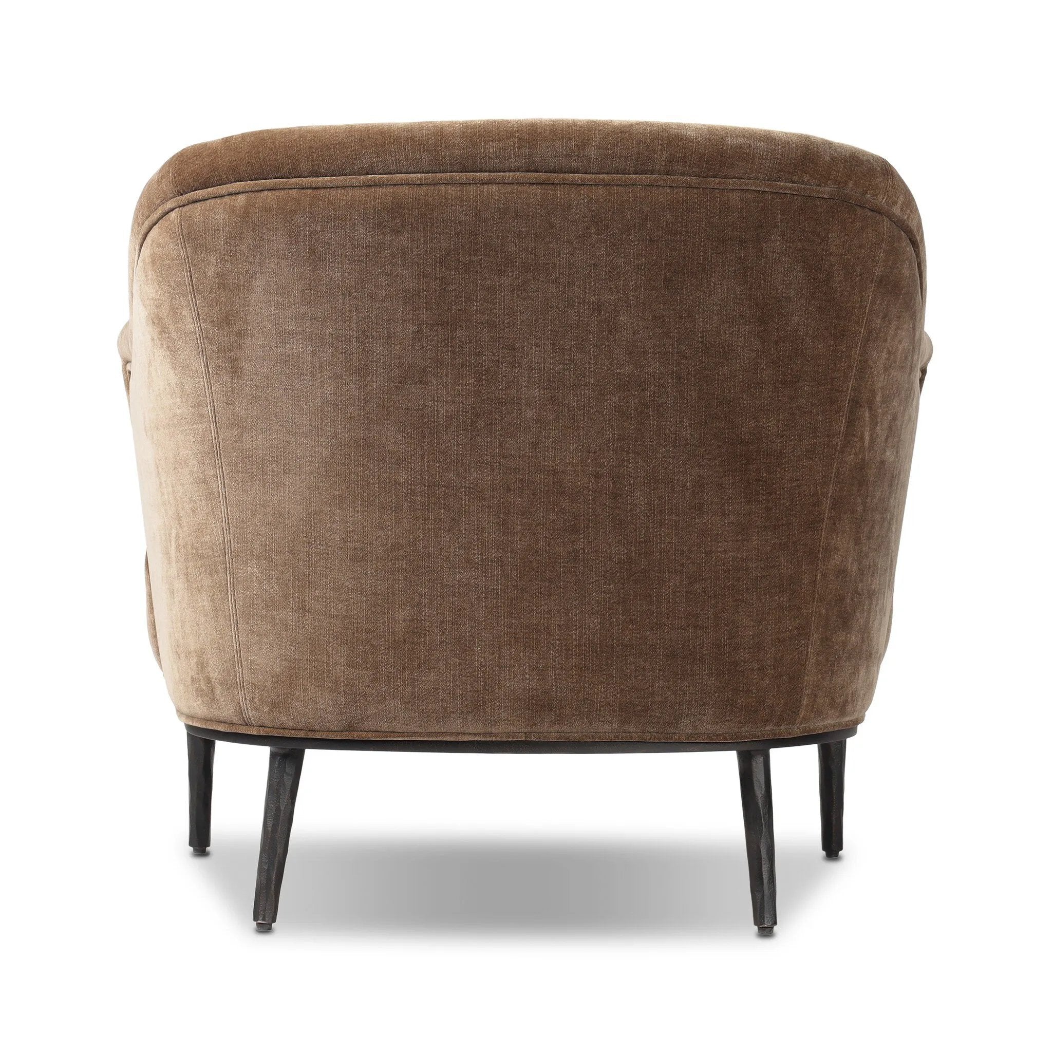 With elements of past eras at play, this updated Deco chair features a rounded back, sloped arms and a dramatic channel. The 