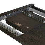 Made from smoked black oak with intentional cracking for an aged look, a self-storing extension creates space for extra guests. Equipped with four lockable wheels for easy extension to 116" Amethyst Home provides interior design, new home construction design consulting, vintage area rugs, and lighting in the Houston metro area.