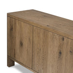 Made from resawn oak with a worn, natural finish, a long, streamlined sideboard offers ample storage space behind four push-latch doors. Subtly rounded corners add softness to otherwise clean lines, while knots and graining offer a naturally rich look. Dual rear cutouts for seamless cord management Amethyst Home provides interior design, new home construction design consulting, vintage area rugs, and lighting in the Calabasas metro area.