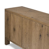 Made from resawn oak with a worn, natural finish, a long, streamlined sideboard offers ample storage space behind four push-latch doors. Subtly rounded corners add softness to otherwise clean lines, while knots and graining offer a naturally rich look. Dual rear cutouts for seamless cord management Amethyst Home provides interior design, new home construction design consulting, vintage area rugs, and lighting in the Calabasas metro area.