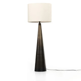 A striking silhouette. An antique brass finish highlights iron's gradual blending of hues for a distinctive ombre effect on this tapered metal base. Topped with a 100% cotton shade Amethyst Home provides interior design, new home construction design consulting, vintage area rugs, and lighting in the Seattle metro area.