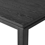 The timeless Parsons table is reimagined, with a rustic black finish and unique relief detail between the tabletop and apron Amethyst Home provides interior design, new home construction design consulting, vintage area rugs, and lighting in the Austin metro area.