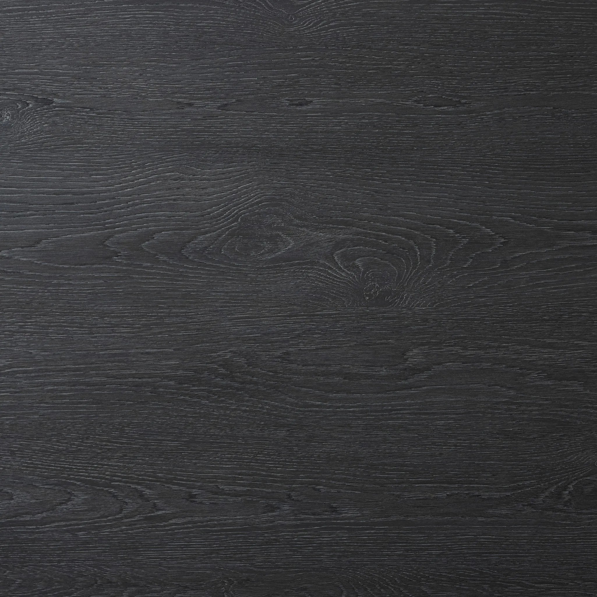 The timeless Parsons table is reimagined, with a rustic black finish and unique relief detail between the tabletop and apron Amethyst Home provides interior design, new home construction design consulting, vintage area rugs, and lighting in the Park City metro area.