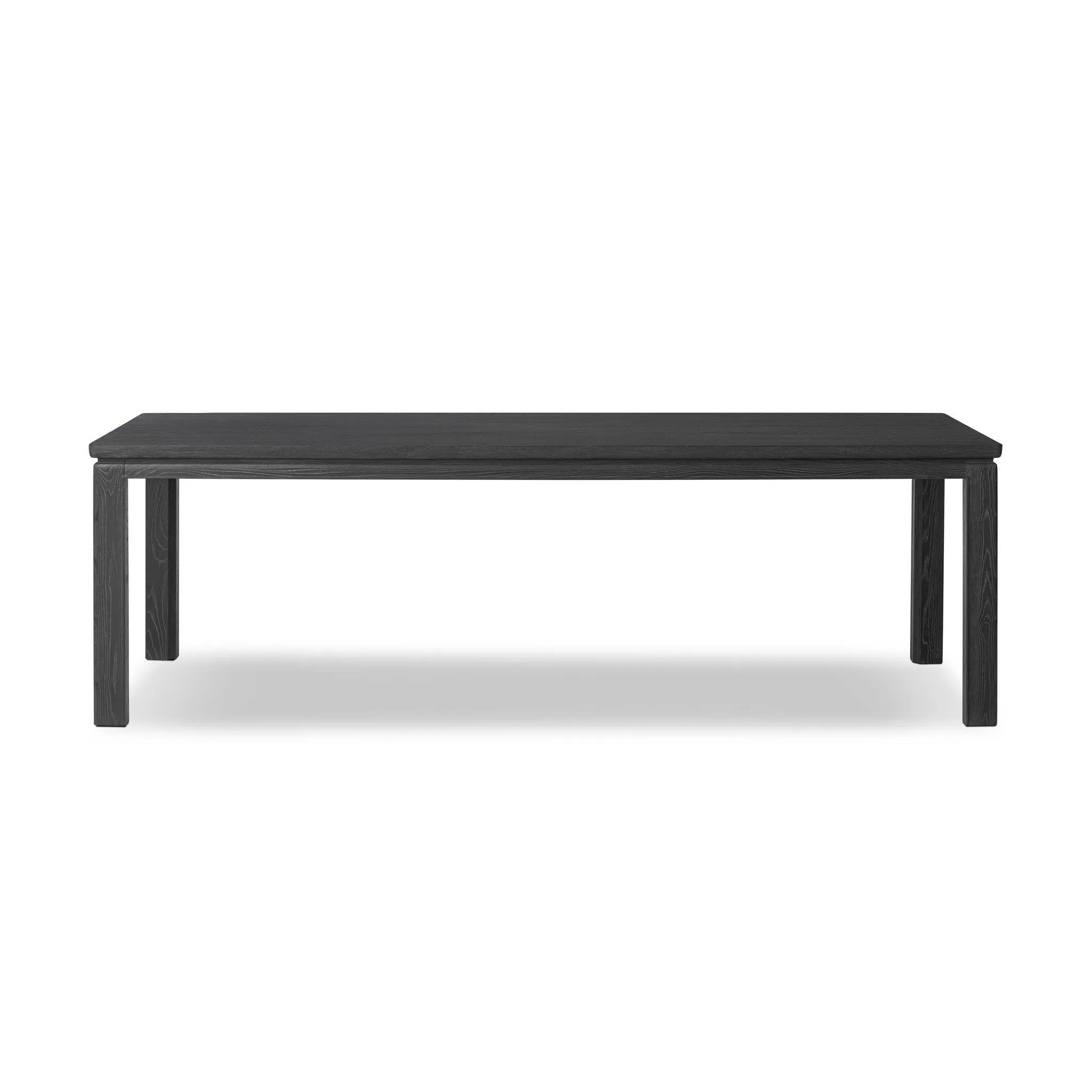 The timeless Parsons table is reimagined, with a rustic black finish and unique relief detail between the tabletop and apron Amethyst Home provides interior design, new home construction design consulting, vintage area rugs, and lighting in the Salt Lake City metro area.