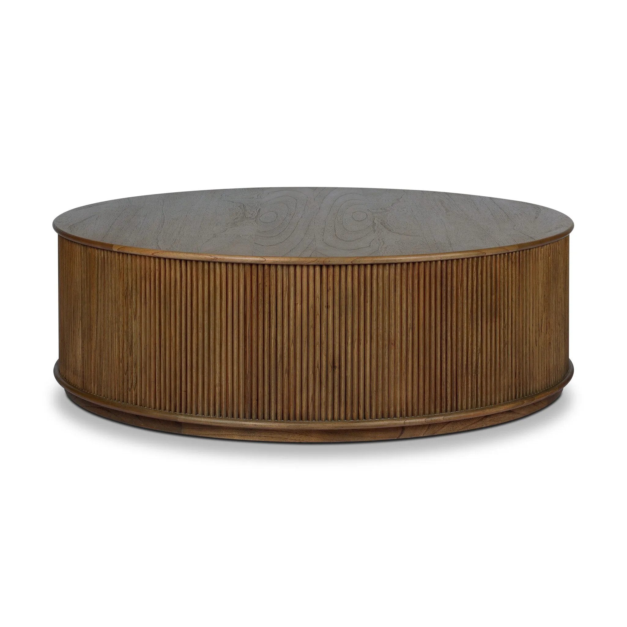 An artisanal take on texture. Made from amber-finished mindi with a plinth-style base, a reeding pattern is carved around the entirety of this coffee table table for a fresh, approachable look.As lovers of natural aesthetics at Amethyst, we love the warm modern inspired Ona Coffee Table - Amber Mindi Veneer. Amethyst Home provides interior design, new home construction design consulting, vintage area rugs, and lighting in the Scottsdale metro area.