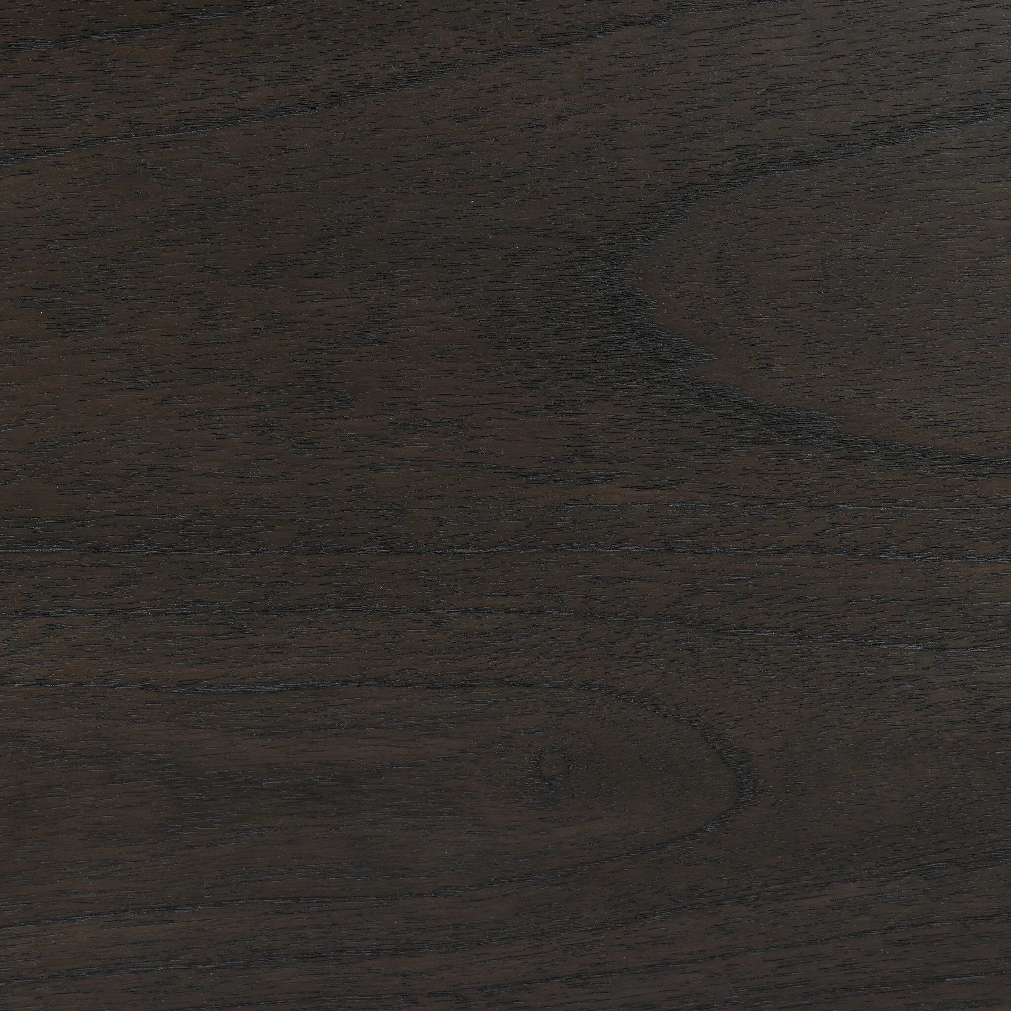 An artisanal take on texture. Made from black-finished mindi with a plinth-style base, a reeding pattern is carved around the entirety of this coffee table table for a fresh, approachable look.As fans of clean style at Amethyst, we love the nature inspired Ona Coffee Table - Smoked Black Mindi - Smoked Black Mindi Veneer. Amethyst Home provides interior design, new home construction design consulting, vintage area rugs, and lighting in the Calabasas metro area.