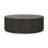 An artisanal take on texture. Made from black-finished mindi with a plinth-style base, a reeding pattern is carved around the entirety of this coffee table table for a fresh, approachable look.As fans of clean style at Amethyst, we love the nature inspired Ona Coffee Table - Smoked Black Mindi - Smoked Black Mindi Veneer. Amethyst Home provides interior design, new home construction design consulting, vintage area rugs, and lighting in the Houston metro area.