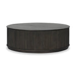 An artisanal take on texture. Made from black-finished mindi with a plinth-style base, a reeding pattern is carved around the entirety of this coffee table table for a fresh, approachable look.As fans of clean style at Amethyst, we love the nature inspired Ona Coffee Table - Smoked Black Mindi - Smoked Black Mindi Veneer. Amethyst Home provides interior design, new home construction design consulting, vintage area rugs, and lighting in the Kansas City metro area.