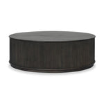 An artisanal take on texture. Made from black-finished mindi with a plinth-style base, a reeding pattern is carved around the entirety of this coffee table table for a fresh, approachable look.As fans of clean style at Amethyst, we love the nature inspired Ona Coffee Table - Smoked Black Mindi - Smoked Black Mindi Veneer. Amethyst Home provides interior design, new home construction design consulting, vintage area rugs, and lighting in the Salt Lake City metro area.