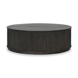 An artisanal take on texture. Made from black-finished mindi with a plinth-style base, a reeding pattern is carved around the entirety of this coffee table table for a fresh, approachable look.As fans of clean style at Amethyst, we love the nature inspired Ona Coffee Table - Smoked Black Mindi - Smoked Black Mindi Veneer. Amethyst Home provides interior design, new home construction design consulting, vintage area rugs, and lighting in the Salt Lake City metro area.