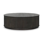 An artisanal take on texture. Made from black-finished mindi with a plinth-style base, a reeding pattern is carved around the entirety of this coffee table table for a fresh, approachable look.As fans of clean style at Amethyst, we love the nature inspired Ona Coffee Table - Smoked Black Mindi - Smoked Black Mindi Veneer. Amethyst Home provides interior design, new home construction design consulting, vintage area rugs, and lighting in the Seattle metro area.