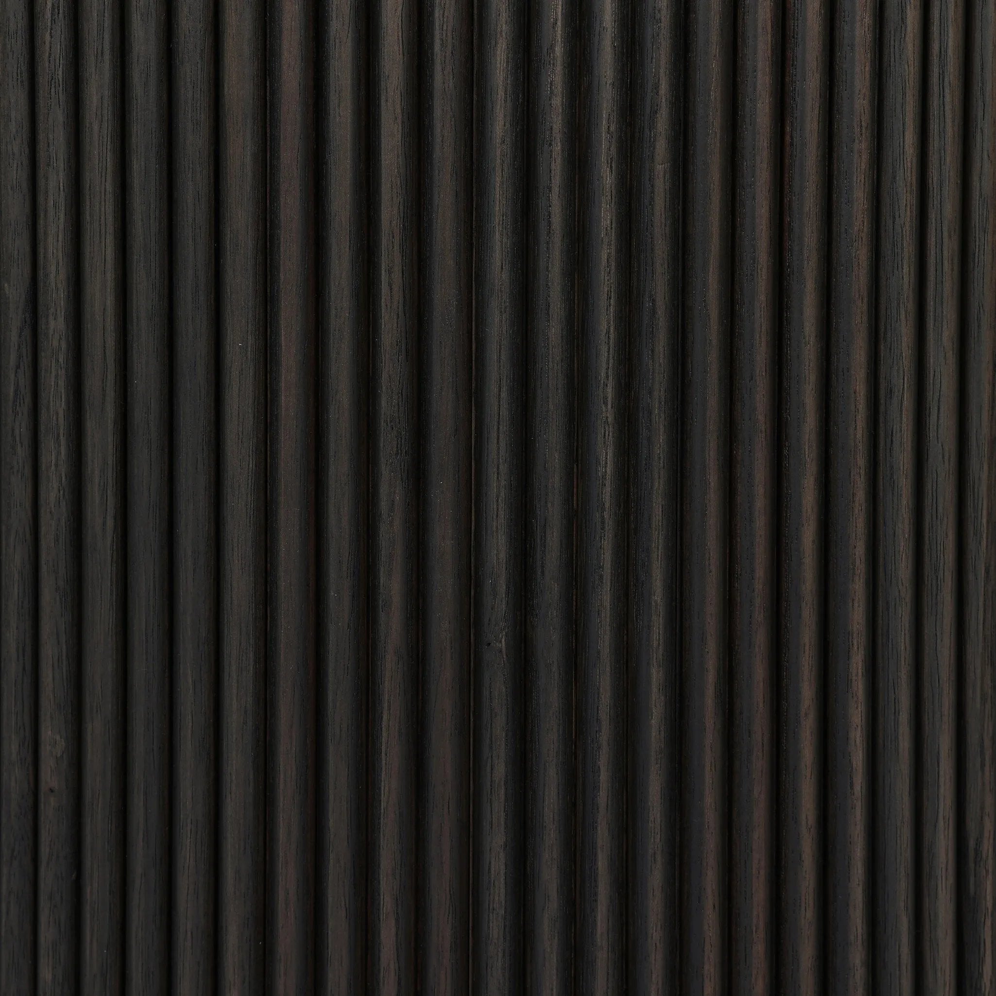 An artisanal take on texture. Made from black-finished mindi with a plinth-style base, a reeding pattern is carved around the entirety of this coffee table table for a fresh, approachable look.As fans of clean style at Amethyst, we love the nature inspired Ona Coffee Table - Smoked Black Mindi - Smoked Black Mindi Veneer. Amethyst Home provides interior design, new home construction design consulting, vintage area rugs, and lighting in the Winter Garden metro area.