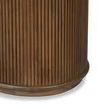 An artisanal take on texture. Made from mindi wood with a plinth-style base, a reeding pattern is carved around the entirety of this versatile end table for a fresh, approachable look.As fans of luxe style at Amethyst, we love the optimistic inspired Ona End Table - Amber Mindi Veneer. Amethyst Home provides interior design, new home construction design consulting, vintage area rugs, and lighting in the Newport Beach metro area.
