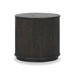 An artisanal take on texture. Made from black-finished mindi wood with a plinth-style base, a reeding pattern is carved around the entirety of this versatile end table for a fresh, approachable look.As lovers of luxe aesthetics at Amethyst, we love the optimistic inspired Ona End Table - Smoked Black Mindi Veneer. Amethyst Home provides interior design, new home construction design consulting, vintage area rugs, and lighting in the Boston metro area.