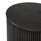 An artisanal take on texture. Made from black-finished mindi wood with a plinth-style base, a reeding pattern is carved around the entirety of this versatile end table for a fresh, approachable look.As lovers of luxe aesthetics at Amethyst, we love the optimistic inspired Ona End Table - Smoked Black Mindi Veneer. Amethyst Home provides interior design, new home construction design consulting, vintage area rugs, and lighting in the Newport Beach metro area.