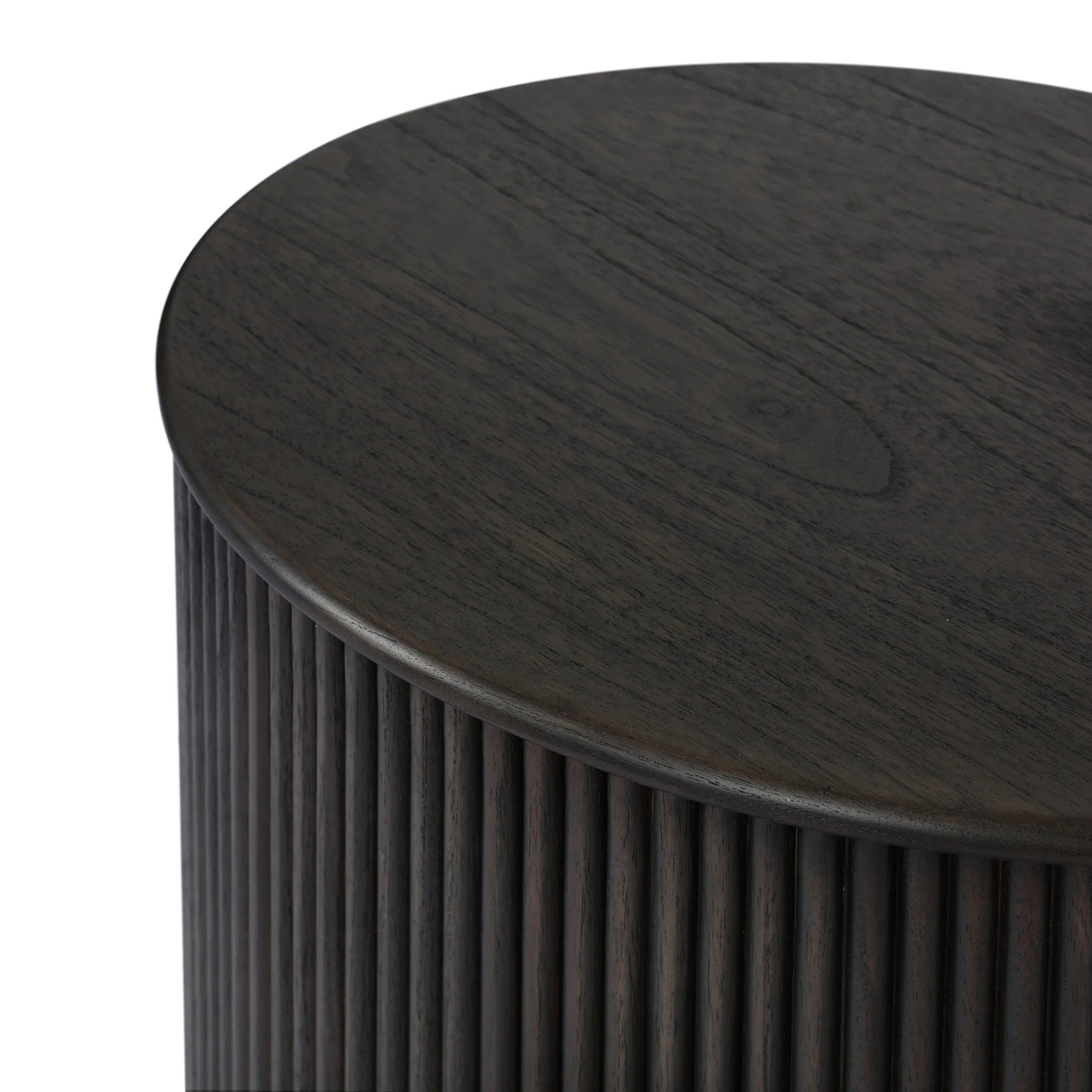An artisanal take on texture. Made from black-finished mindi wood with a plinth-style base, a reeding pattern is carved around the entirety of this versatile end table for a fresh, approachable look.As lovers of luxe aesthetics at Amethyst, we love the optimistic inspired Ona End Table - Smoked Black Mindi Veneer. Amethyst Home provides interior design, new home construction design consulting, vintage area rugs, and lighting in the Newport Beach metro area.