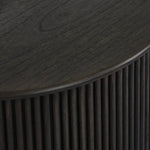 An artisanal take on texture. Made from black-finished mindi wood with a plinth-style base, a reeding pattern is carved around the entirety of this versatile end table for a fresh, approachable look.As lovers of luxe aesthetics at Amethyst, we love the optimistic inspired Ona End Table - Smoked Black Mindi Veneer. Amethyst Home provides interior design, new home construction design consulting, vintage area rugs, and lighting in the Park City metro area.