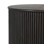 An artisanal take on texture. Made from black-finished mindi wood with a plinth-style base, a reeding pattern is carved around the entirety of this versatile end table for a fresh, approachable look.As lovers of luxe aesthetics at Amethyst, we love the optimistic inspired Ona End Table - Smoked Black Mindi Veneer. Amethyst Home provides interior design, new home construction design consulting, vintage area rugs, and lighting in the Winter Garden metro area.