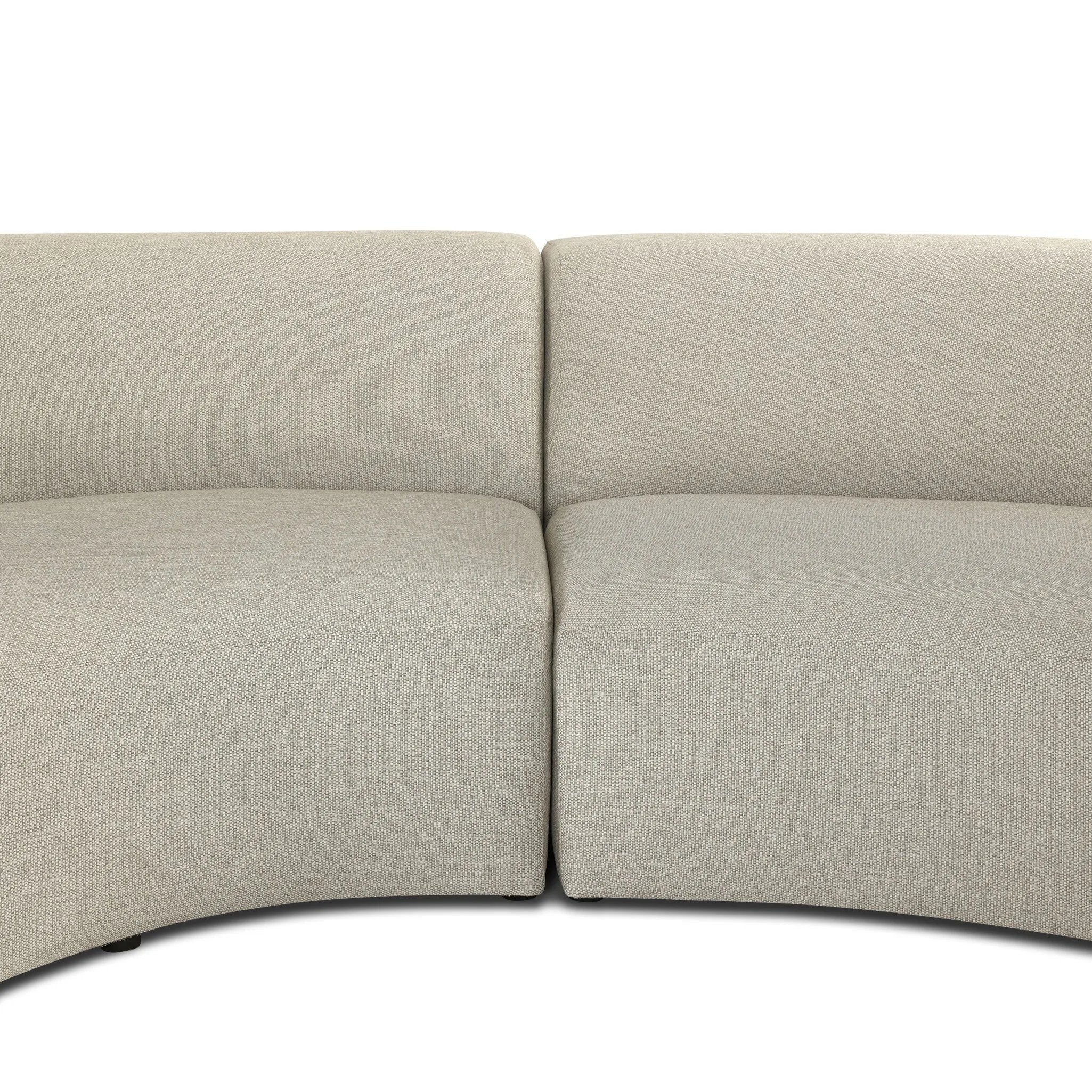 Bring a hint of old-Hollywood glamour outdoors with this soft, sculptural sectional. Plush cushioning all around is upholstered in UV-resistant, water-repellent, quick-drying fabric. Cover or store inside during inclement weather and when not in use. Amethyst Home provides interior design, new home construction design consulting, vintage area rugs, and lighting in the Monterey metro area.