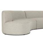 Bring a hint of old-Hollywood glamour outdoors with this soft, sculptural sectional. Plush cushioning all around is upholstered in UV-resistant, water-repellent, quick-drying fabric. Cover or store inside during inclement weather and when not in use. Amethyst Home provides interior design, new home construction design consulting, vintage area rugs, and lighting in the Scottsdale metro area.
