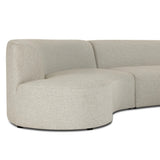 Bring a hint of old-Hollywood glamour outdoors with this soft, sculptural sectional. Plush cushioning all around is upholstered in UV-resistant, water-repellent, quick-drying fabric. Cover or store inside during inclement weather and when not in use. Amethyst Home provides interior design, new home construction design consulting, vintage area rugs, and lighting in the Scottsdale metro area.