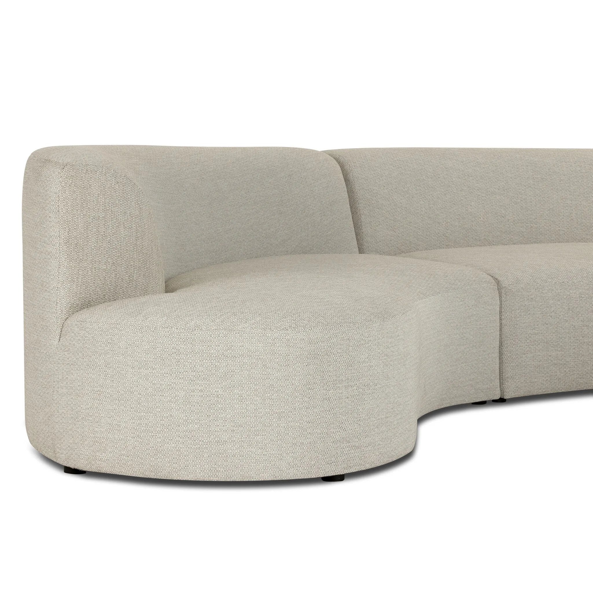 Bring a hint of old-Hollywood glamour outdoors with this soft, sculptural sectional. Plush cushioning all around is upholstered in UV-resistant, water-repellent, quick-drying fabric. Cover or store inside during inclement weather and when not in use. Amethyst Home provides interior design, new home construction design consulting, vintage area rugs, and lighting in the Scottsdale metro area.