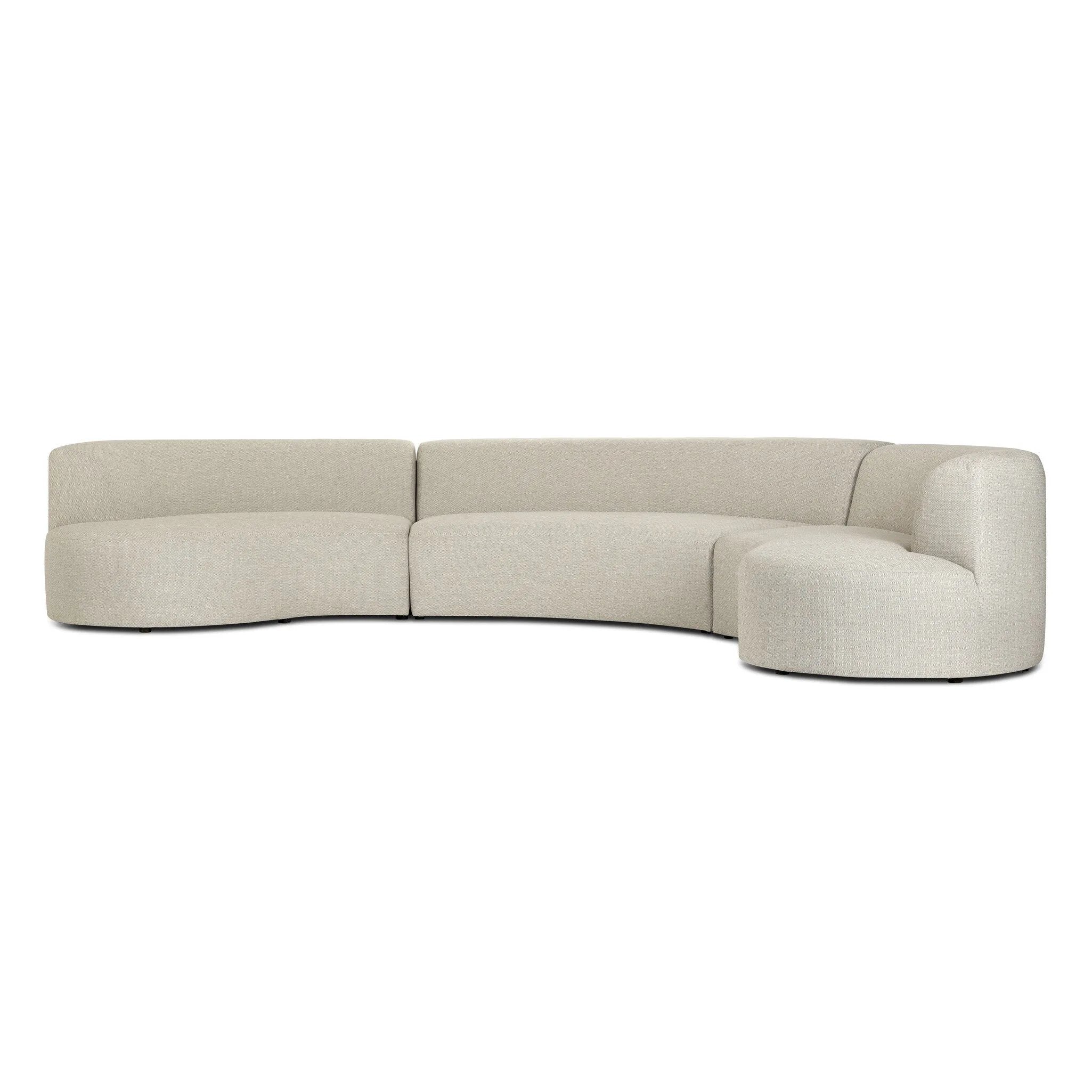 Bring a hint of old-Hollywood glamour outdoors with this soft, sculptural sectional. Plush cushioning all around is upholstered in UV-resistant, water-repellent, quick-drying fabric. Cover or store inside during inclement weather and when not in use. Amethyst Home provides interior design, new home construction design consulting, vintage area rugs, and lighting in the Tampa metro area.