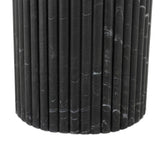 Inspired by Italian design, a swirling marble base is scalloped for a linear look with heavy texture, finished with a rounded, bistro-size tabletop of polished black marble Amethyst Home provides interior design, new home construction design consulting, vintage area rugs, and lighting in the Dallas metro area.