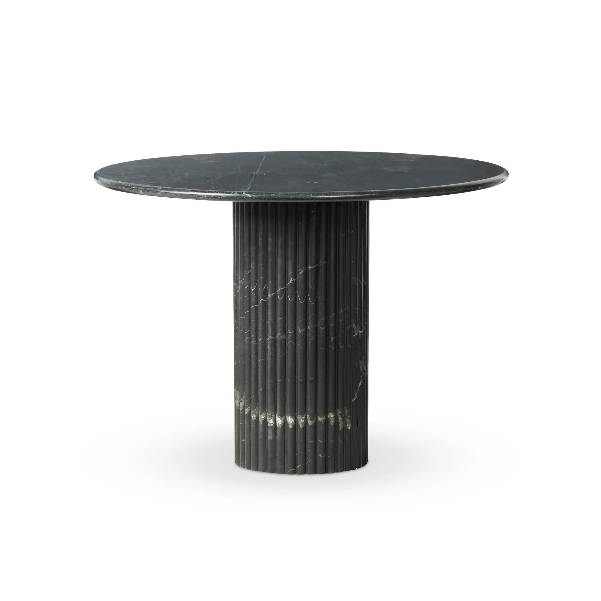 Inspired by Italian design, a swirling marble base is scalloped for a linear look with heavy texture, finished with a rounded, bistro-size tabletop of polished black marble Amethyst Home provides interior design, new home construction design consulting, vintage area rugs, and lighting in the Scottsdale metro area.