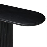 Italian-inspired for effortless sophistication. A black marble base is scalloped for a linear look with heavy texture, finished with a pill-shaped top for extra entryway styling atop this console table.As lovers of organic modern aesthetics at Amethyst, we love the designer inspired Oranda Console Table - Black Marble. Amethyst Home provides interior design, new home construction design consulting, vintage area rugs, and lighting in the Los Angeles metro area.