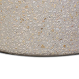 Natural stones form a neutral terrazzo pattern on a cream base, bringing a sense of texture and depth to this versatile coffee table. Designed with a clean, rounded silhouette, it works effortlessly in both indoor and outdoor spaces. Cover or store indoors during inclement weather and when not in use Amethyst Home provides interior design, new home construction design consulting, vintage area rugs, and lighting in the Nashville metro area.