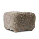 A subtle sweetheart shape paired with beige shearling plays into this ottoman's found object appeal. S-spring suspension offers a comfy place to sit and the shearling upholstery brings depth and vintage vibes throughout. Perfect styled alone or as part of a set for added drama. A design collaboration by Amber Lewis and Four Hands. Amethyst Home provides interior design, new home construction design consulting, vintage area rugs, and lighting in the Des Moines metro area.